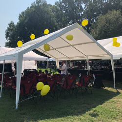 sober tailgate tent with yellow balloons